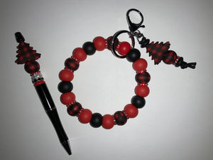 Wristlet/keychain and pen combo set